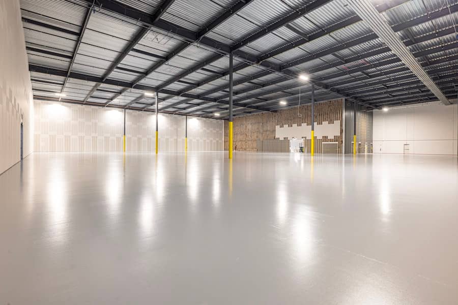 Warehouse concrete floor under racking with forklift traffic aisles