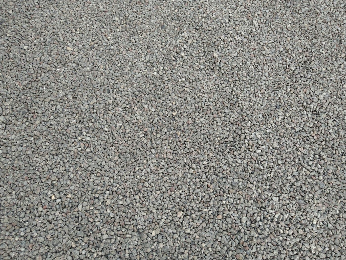Polished gray concrete floor with a soft reflective sheen
